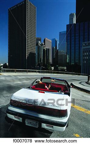 California, Los Angeles, convertible on road View Large Photo Image Stock Photo - California, Los Angeles, convertible on road. Fotosearch