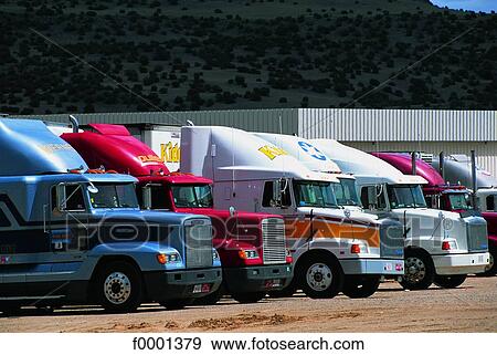 Stock Photo - New Mexico, trucks alongside route 66. Fotosearch