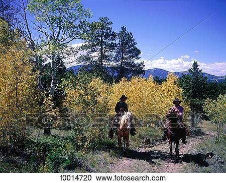 Colorado, Lake St Georges vicinity, two cow-boys riding View Large Photo Image Stock Image - Colorado, Lake St Georges vicinity, two cow-boys riding. Fotosearch