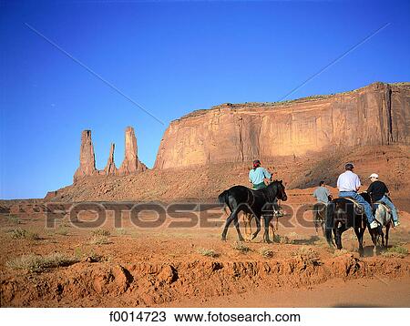 Utah, Monument Valley, Three sisters, Navajo riders View Large Photo Image Stock Image - Utah, Monument Valley, Three sisters, Navajo riders. Fotosearch