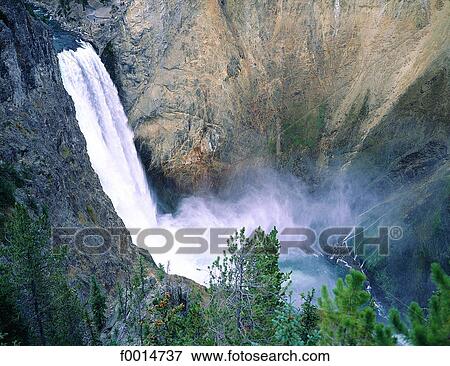 Wyoming, Yellowstone park, large waterfall View Large Photo Image Stock Photo - Wyoming, Yellowstone park, large waterfall. Fotosearch