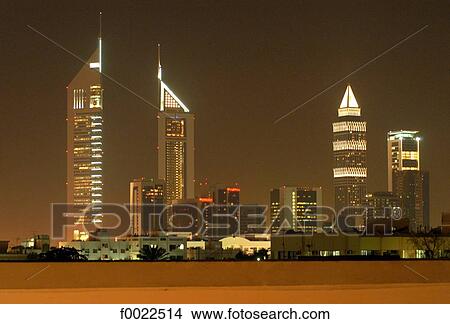United Arab Emirates, Dubai, towers by night View Large Photo Image Picture - United Arab Emirates, Dubai, towers by night. Fotosearch