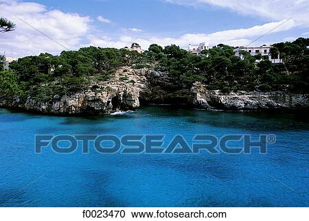 Spain, Balearic Islands, Majorca, Cala Santanyi, coastal landscape View Large Photo Image Stock Image - Spain, Balearic Islands, Majorca, Cala Santanyi, coastal landscape. Fotosearch