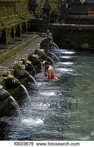 Indonesia, Bali, near Ubud, Tirta Empul Temple, sacred public baths View Large Photo Image Stock Photo - Indonesia, Bali, near Ubud, Tirta Empul Temple, sacred public baths. Fotosearch
