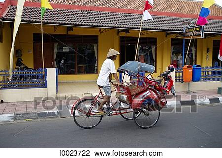 Indonesia, Java, Yogyakarta, Kraton district, rickshaw View Large Photo Image Stock Image - Indonesia, Java, Yogyakarta, Kraton district, rickshaw. Fotosearch