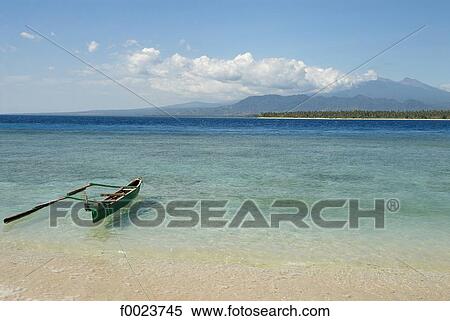 Indonesia, Lombok, Gili Islands, Gili Air, outrigger View Large Photo Image Stock Photography - Indonesia, Lombok, Gili Islands, Gili Air, outrigger. Fotosearch