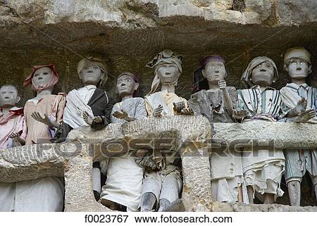 Stock Photo - Indonesia, Sulawesi, Tana Toraja, Kete Kesu, Torajan cemetery, statuettes. Fotosearch