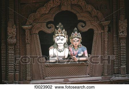 Nepal, Kathmandu, Durbar Square, Shiva and Parvati Temple, statues of divinities gazing down from a second-floor window View Large Photo Image Stock Image - Nepal, Kathmandu, Durbar Square, Shiva and Parvati Temple, statues of divinities gazing down from a second-floor window. Fotosearch