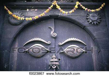 Stock Photo - Nepal, Kathmandu, sculpted door. Fotosearch