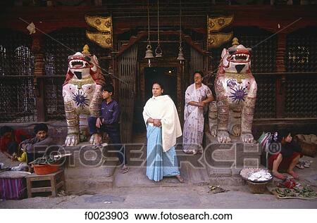 Nepal, Kathmandu, statues of lions at a temple's entrance View Large Photo Image Stock Image - Nepal, Kathmandu, statues of lions at a temple's entrance. Fotosearch
