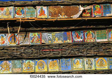 China, Tibet, Lhasa, Chagpo Ri, painted and carved stones depicting Buddhist divinities View Large Photo Image Stock Photography - China, Tibet, Lhasa, Chagpo Ri, painted and carved stones depicting Buddhist divinities. Fotosearch