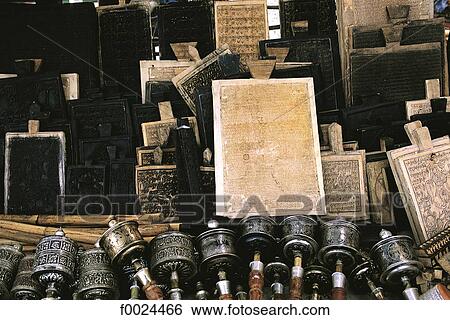 China, Tibet, Lhasa, The Barkhor, prayer wheels and xylographic blocks View Large Photo Image Stock Photograph - China, Tibet, Lhasa, The Barkhor, prayer wheels and xylographic blocks. Fotosearch