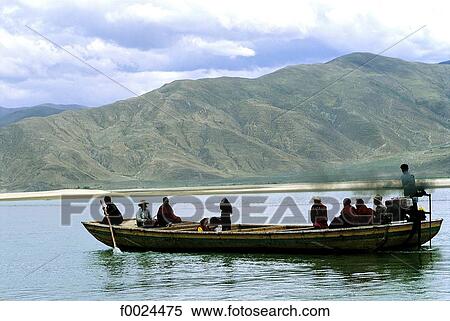 Stock Photography - China, Tibet, Samye, Brahmaputra crossing by boat. Fotosearch