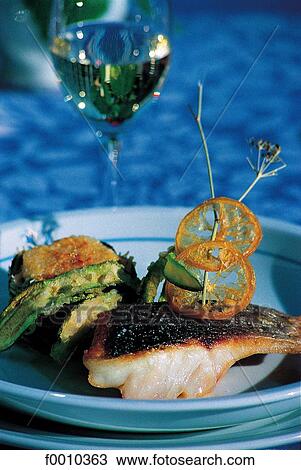 Stock Image - France, French Riviera, Beaulieu-sur-Mer, fish dish. Fotosearch