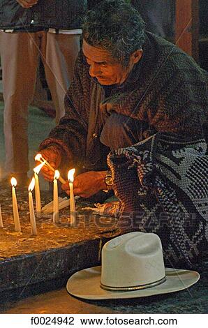 Stock Image - Guatemala, Chichicastenango, Santo Tomas church, faithful at prayer. Fotosearch
