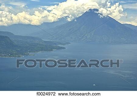Stock Image - Guatemala, lake Atitlan, volcanoes. Fotosearch
