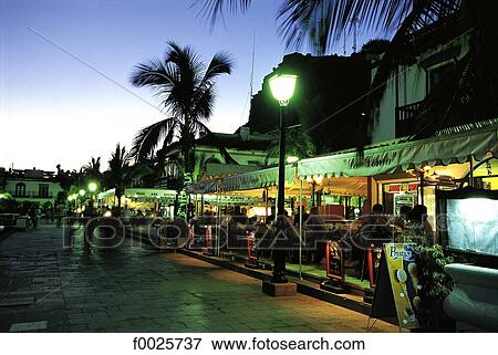 Spain, Canary Islands, Gran Canaria, Puerto Mogan, seafront restaurants View Large Photo Image Stock Photo - Spain, Canary Islands, Gran Canaria, Puerto Mogan, seafront restaurants. Fotosearch