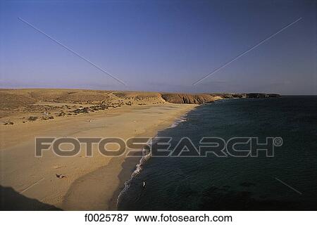 Stock Photo - Spain, Canary Islands, Lanzarote, Playa del Papagayo. Fotosearch