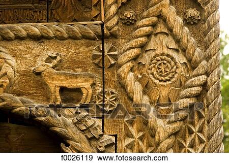 Stock Photo - Romania, Maramures, close-up of carved door. Fotosearch