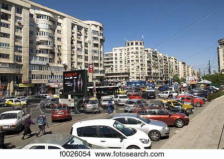 Picture - Romania, Muntenia, Bucharest, Unirii Boulevard, traffic. Fotosearch