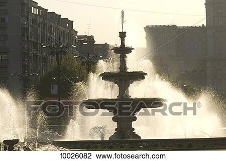 Stock Image - Romania, Muntenia, Bucharest, Unirii Square, fountain. Fotosearch