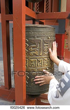 Stock Photograph - China, Beijing, Lama temple, prayer wheel. Fotosearch