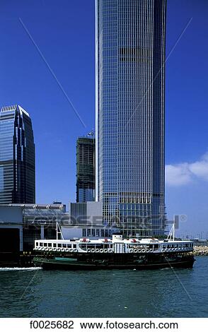 Stock Image - China, Hong Kong, Star Ferry and building. Fotosearch