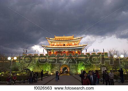 Stock Image - China, Yunnan, Dali, old city gate and city walls. Fotosearch