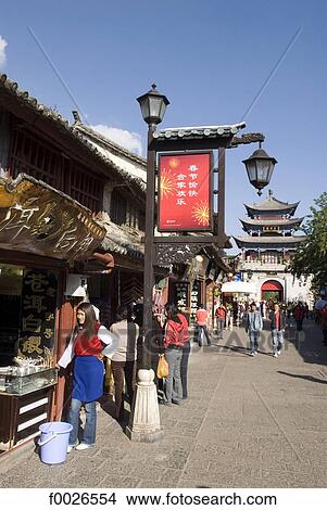 China, Yunnan, Dali, shops and old city gate View Large Photo Image Picture - China, Yunnan, Dali, shops and old city gate. Fotosearch