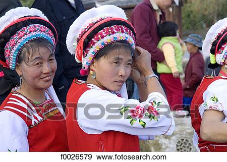 China, Yunnan, Lijiang, Bai women portrait View Large Photo Image Stock Photo - China, Yunnan, Lijiang, Bai women portrait. Fotosearch