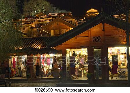 China, Yunnan, Lijiang, souvenir shops by night View Large Photo Image Stock Image - China, Yunnan, Lijiang, souvenir shops by night. Fotosearch