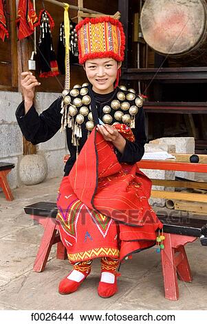 China, Yunnan, near Kunming, Yunnan Nationalities Village, young Jingpo woman View Large Photo Image Picture - China, Yunnan, near Kunming, Yunnan Nationalities Village, young Jingpo woman. Fotosearch