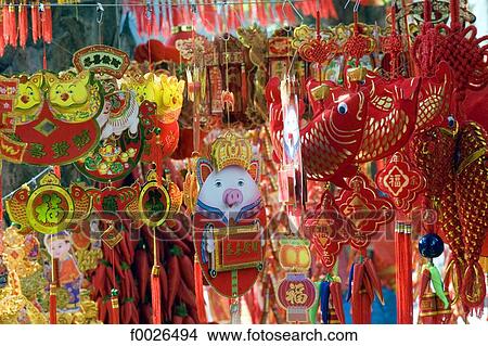 China, Yunnan, Xishuangbanna, Jinghong, Chinese lucky charms for sale View Large Photo Image Picture - China, Yunnan, Xishuangbanna, Jinghong, Chinese lucky charms for sale. Fotosearch