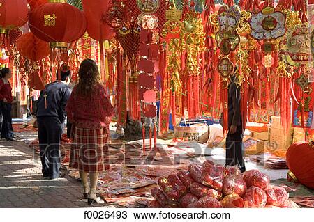 China, Yunnan, Xishuangbanna, Jinghong, Chinese lucky charms for sale View Large Photo Image Stock Image - China, Yunnan, Xishuangbanna, Jinghong, Chinese lucky charms for sale. Fotosearch