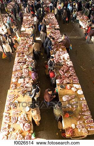 China, Yunnan, Xishuangbanna, Menghai, market, butchers View Large Photo Image Picture - China, Yunnan, Xishuangbanna, Menghai, market, butchers. Fotosearch