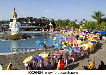China, Yunnan, Xishuangbanna, near Jinghong, Dai Minority Park, during Water Splashing Festival View Large Photo Image Picture - China, Yunnan, Xishuangbanna, near Jinghong, Dai Minority Park, during Water Splashing Festival. Fotosearch