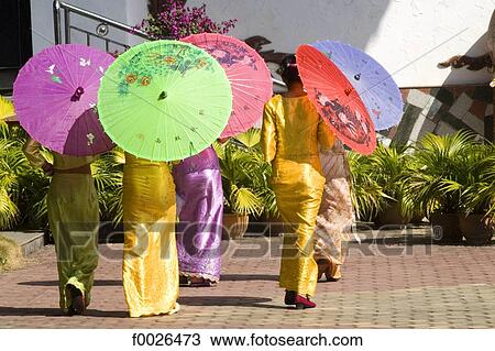 China, Yunnan, Xishuangbanna, near Jinghong, Dai Minority Park, young Dai women View Large Photo Image Stock Image - China, Yunnan, Xishuangbanna, near Jinghong, Dai Minority Park, young Dai women. Fotosearch