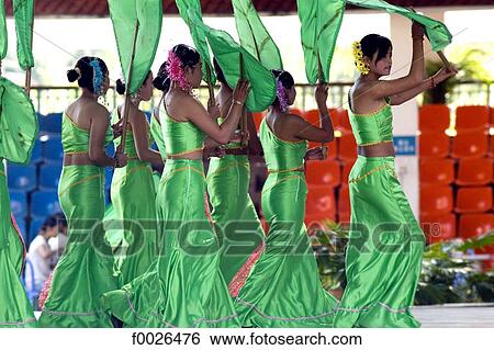 Stock Photograph - China, Yunnan, Xishuangbanna, near Jinghong, Dai Minority Park, young Dai dancers. Fotosearch
