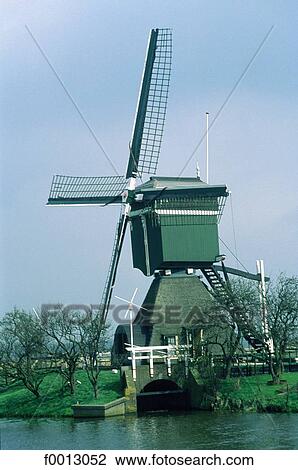 The Netherlands, North Holland, Zaanstad, wooden windmill View Large Photo Image Stock Image - The Netherlands, North Holland, Zaanstad, wooden windmill. Fotosearch