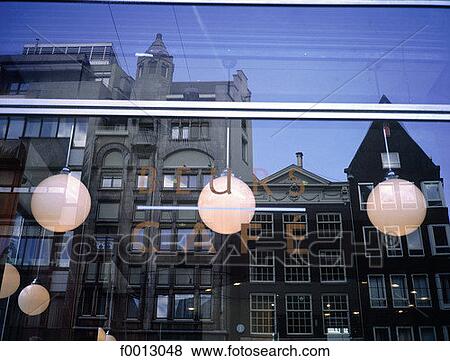 The Netherlands, North Holland, Amsterdam, traditional dwellings reflected on a cafe window View Large Photo Image Stock Photo - The Netherlands, North Holland, Amsterdam, traditional dwellings reflected on a cafe window. Fotosearch