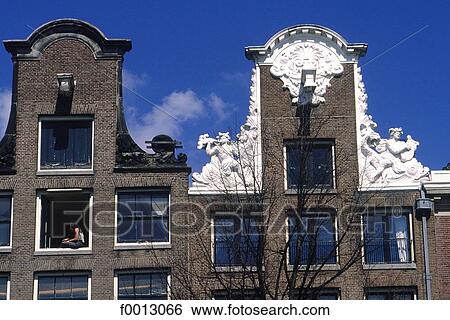 Stock Photograph - The Netherlands, North Holland, Amsterdam, old facades. Fotosearch