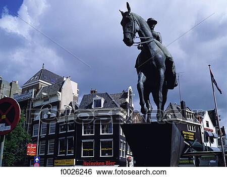 Stock Photograph - The Netherlands, North Holland, Amsterdam, equestrian statue. Fotosearch