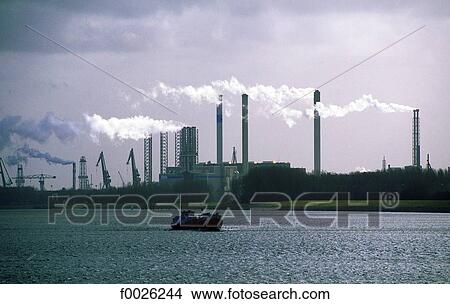 The Netherlands, South Holland, Rotterdam, port industries on Meuse River View Large Photo Image Picture - The Netherlands, South Holland, Rotterdam, port industries on Meuse River. Fotosearch