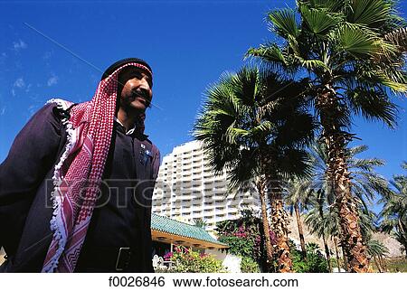 Israel, Eilat, man in front of the Princess Hotel View Large Photo Image Stock Photograph - Israel, Eilat, man in front of the Princess Hotel. Fotosearch
