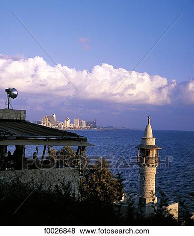 Israel, glimpse of Tel Aviv from Jaffa, minaret in the foreground View Large Photo Image Stock Photo - Israel, glimpse of Tel Aviv from Jaffa, minaret in the foreground. Fotosearch