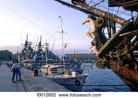 Stock Image - Spain, Barcelona, the port at dusk. Fotosearch
