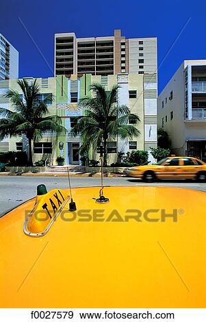 United States, Florida, Miami Beach, buildings and cab View Large Photo Image Stock Photo - United States, Florida, Miami Beach, buildings and cab. Fotosearch