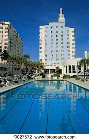 Stock Image - United States, Florida, Miami, swimming pool at resort. Fotosearch