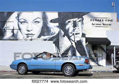 Picture - United States, California, Los Angeles, Hollywood, mural and convertible. Fotosearch