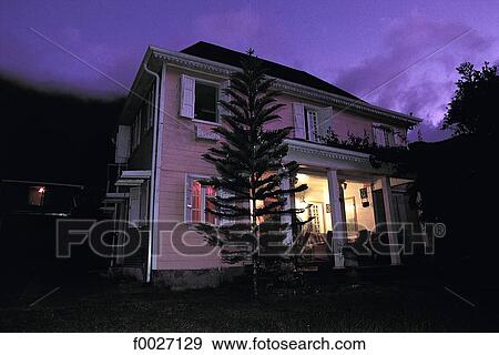 Stock Photo - Reunion, Salazie, colonial style hotel by night. Fotosearch